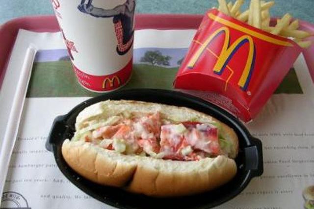 McDonald's has a lobster roll but they only serve it at some restaurants in New England and Canada. They call it the McLobster sandwich and it's served with white McLobster sauce made out of mayo, salad dressing and tartar sauce and the commercial gives us nightmares. But man... the price is right.